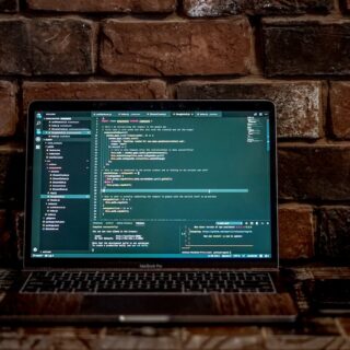 gray laptop computer turned-on