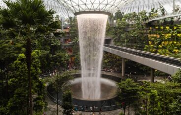 a large waterfall in the middle of a building
